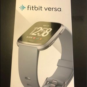 Fitbit Versa with three extra leather bands
